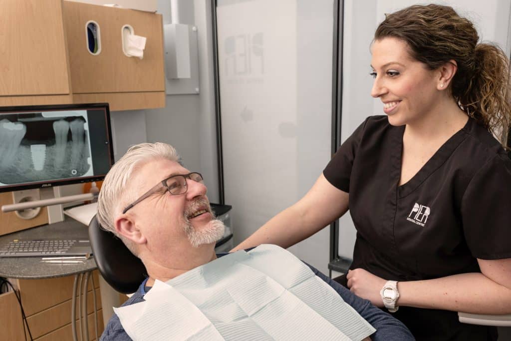 dentist talking to a patient