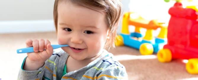 toddlers brushing teeth